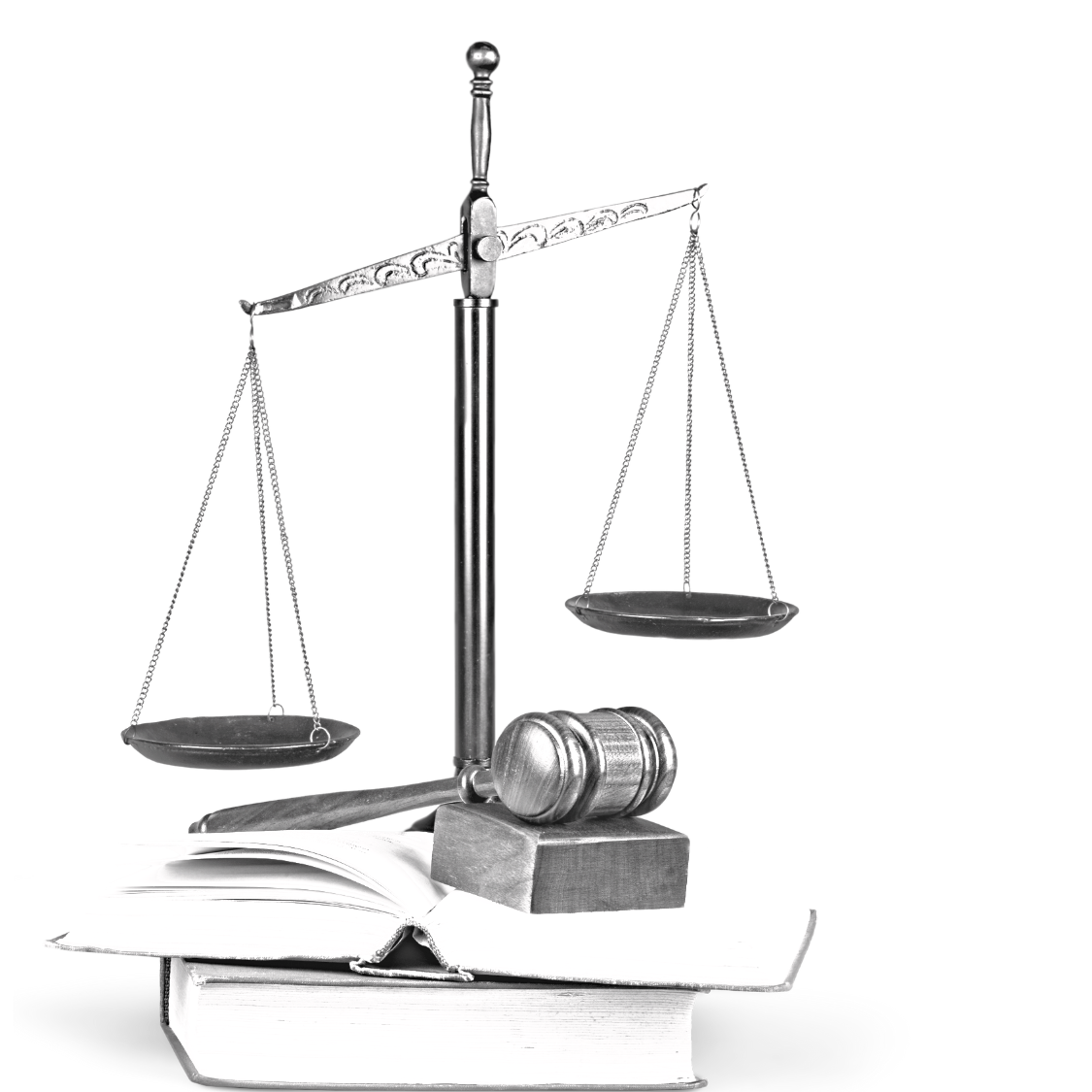 black and white photo of the scales of justice next to a gavel and books